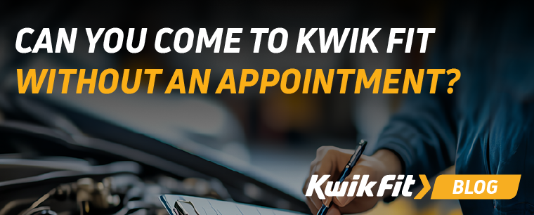 A person writing on a piece of paper on a clipboard